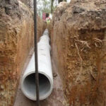 Sewer pipe being installed